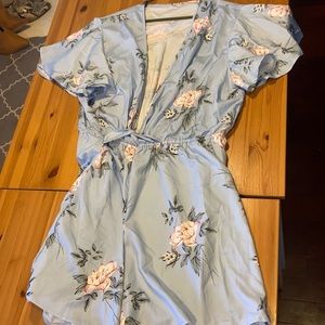 Light blue wrap romper with skirt Peice
